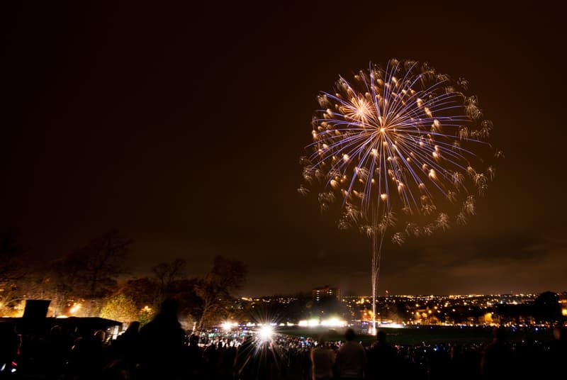 Spectators watch a fireworks display in November 2014 during Bonfire night (© Stephen Bowler, CC BY 2.0)