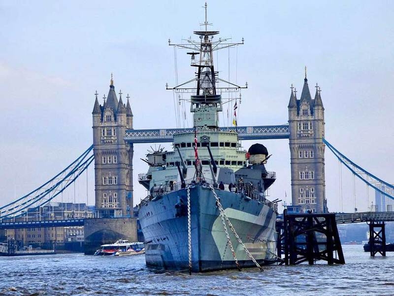 HMS Belfast, a retired warship, is moored on the south bank of the Thames