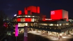 An artistic lighting scheme illuminating the exterior of the Royal National Theatre (© David Samuel, CC BY-SA 3.0)