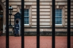 A guard standing outside of Buckingham Palace