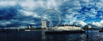 Skyline photography of the London Eye under white cloudy sky during daytime