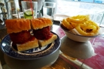 Two meatballs, and a bowl of onion rings. The latter weren't brilliant, but plenty of flavour (and, er, meatiness) in the meatballs. At Mishkin's, Covent Garden (© Ewan Munro, CC BY-SA 2.0)