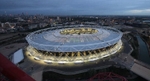 Aerial view of former Olympic Stadium by night
